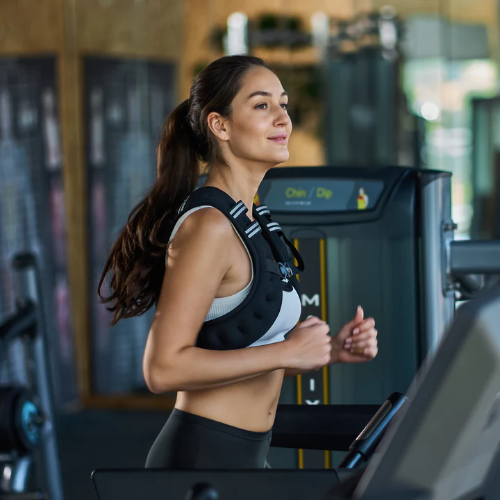 Treadmill with weighted vest